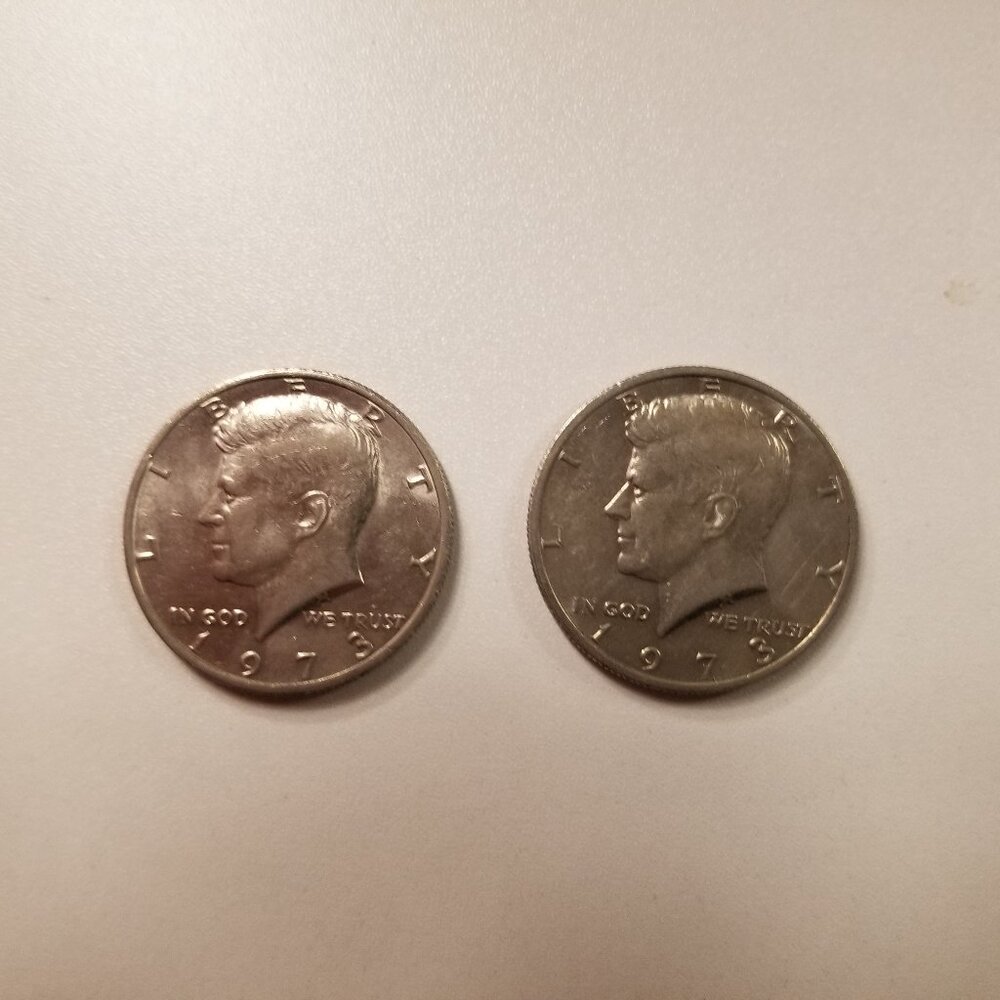 The 1973 (no-mint) Kennedy Half Dollar (Two 1973 no-mint)
